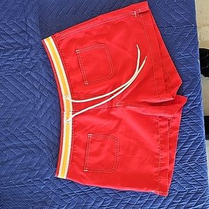 Junior cargo shorts red and neon orange size 9/11 medium.